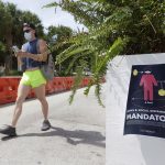 Florida’s new coronavirus cases break record, nearly tying New York’s peak