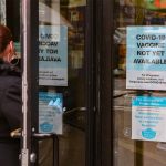 Walgreens signs remind people COVID-19 vaccine isn’t ready