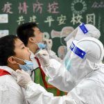 Strict lockdowns, experimental vaccine helped China recover from COVID-19