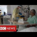 Hospitals under pressure again as Covid admissions rise sharply – BBC News